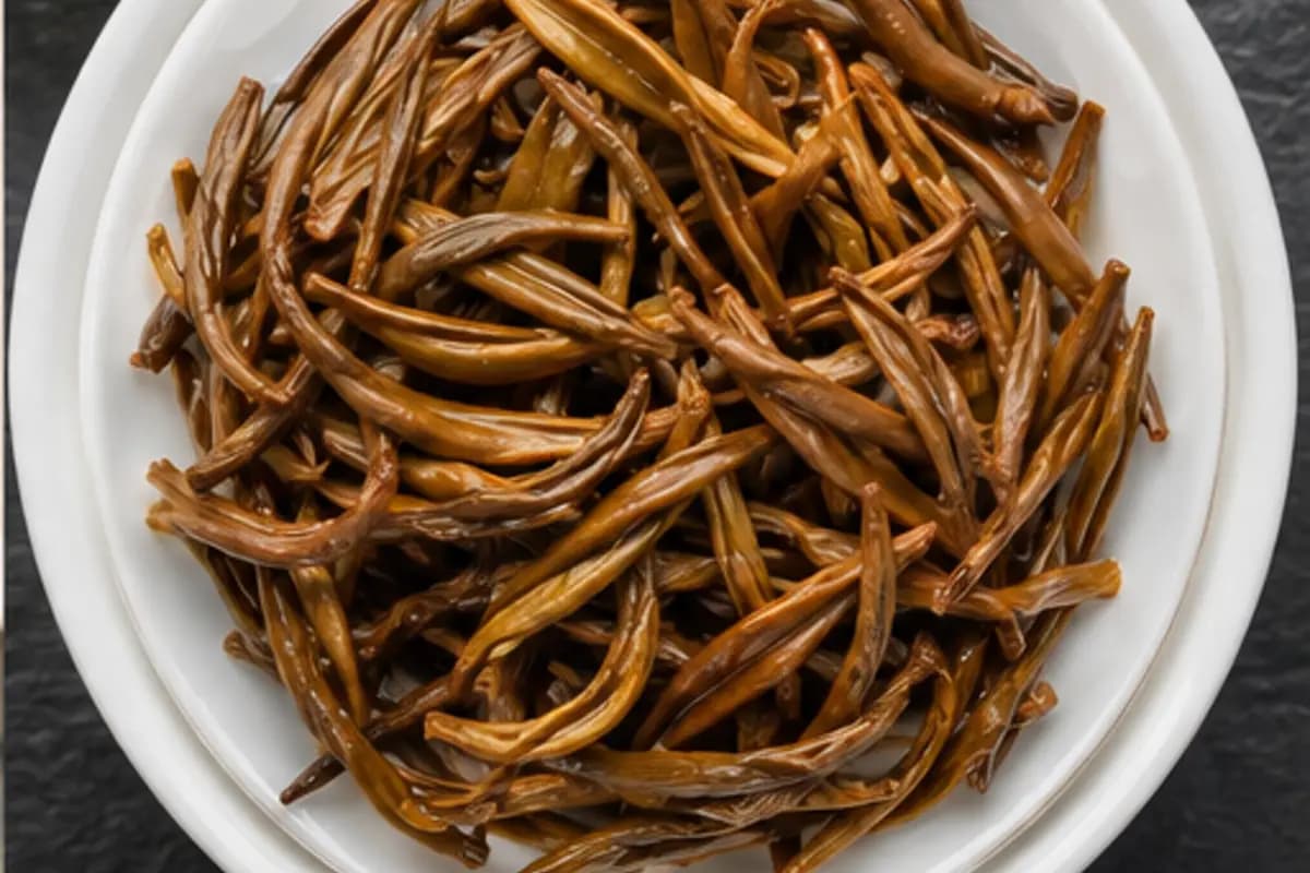 Uniform copper-brown infused leaf of golden tips black tea